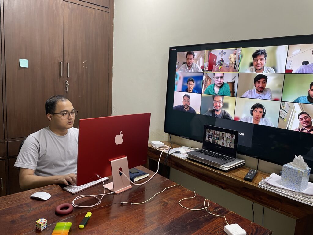 Engineer maintaining a long-running production system during a distributed team collaboration
